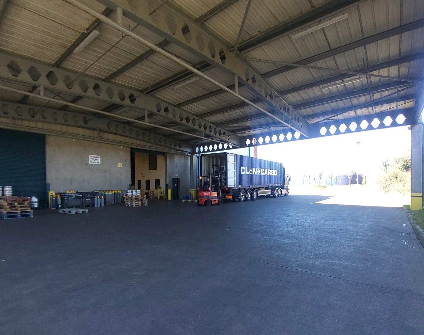 Warehouse loading dock with cargo truck